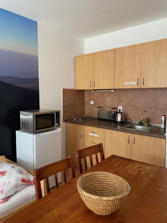 Kuchyň nebo kuchyňský kout v ubytování GRAN hostel