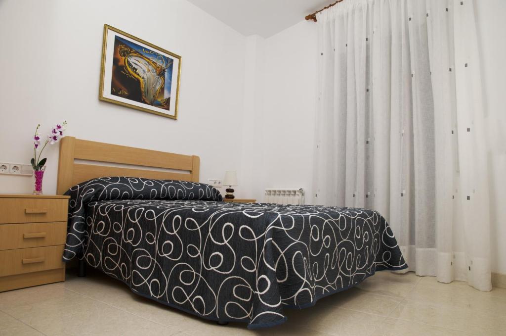Postel nebo postele na pokoji v ubytování Apartamentos Navas 2