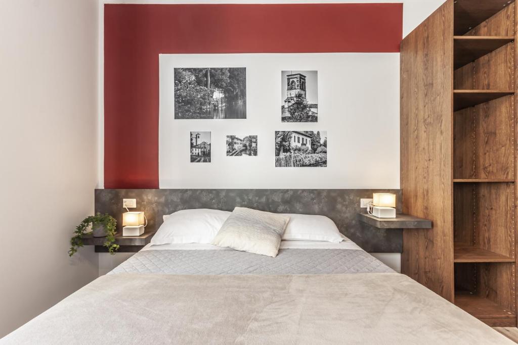 Łóżko lub łóżka w pokoju w obiekcie MilanRentals - Altea Apartment