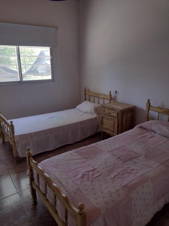 Una cama o camas en una habitación de Culoteland