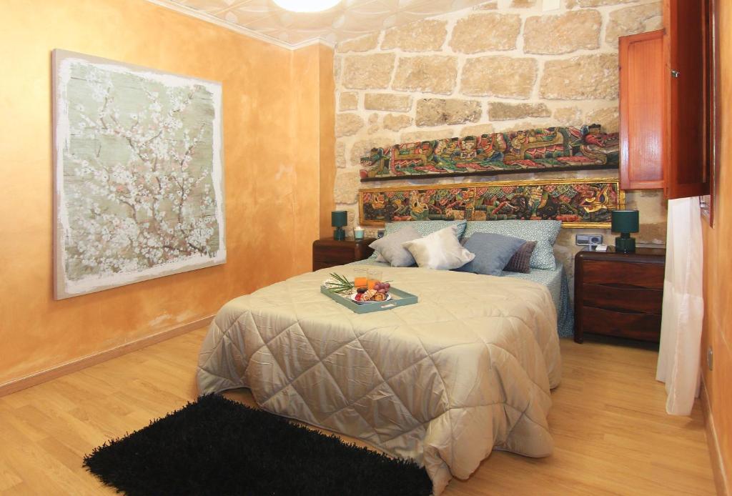 Postel nebo postele na pokoji v ubytování Casa Marrón Boutique Home