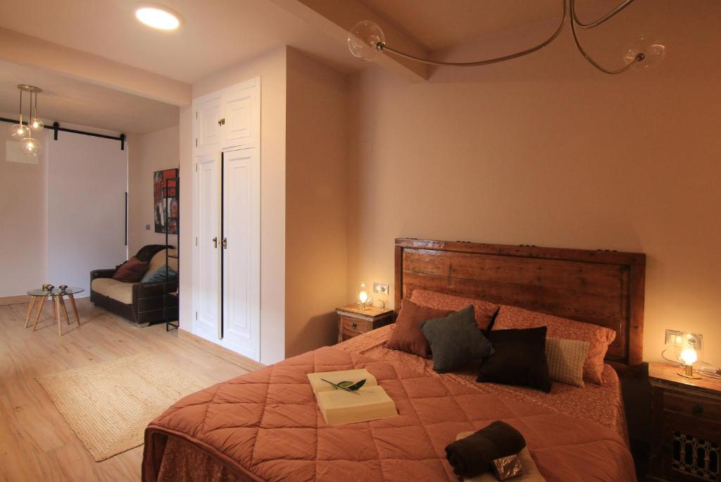 Postel nebo postele na pokoji v ubytování Casa Marrón Boutique Home