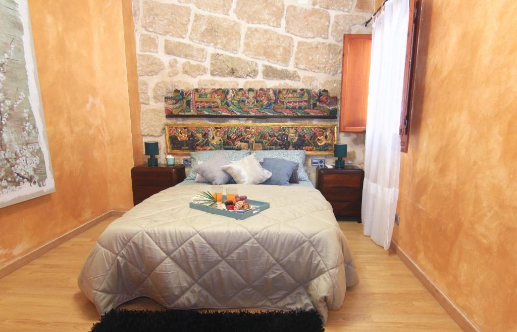 Postel nebo postele na pokoji v ubytování Casa Marrón Boutique Home