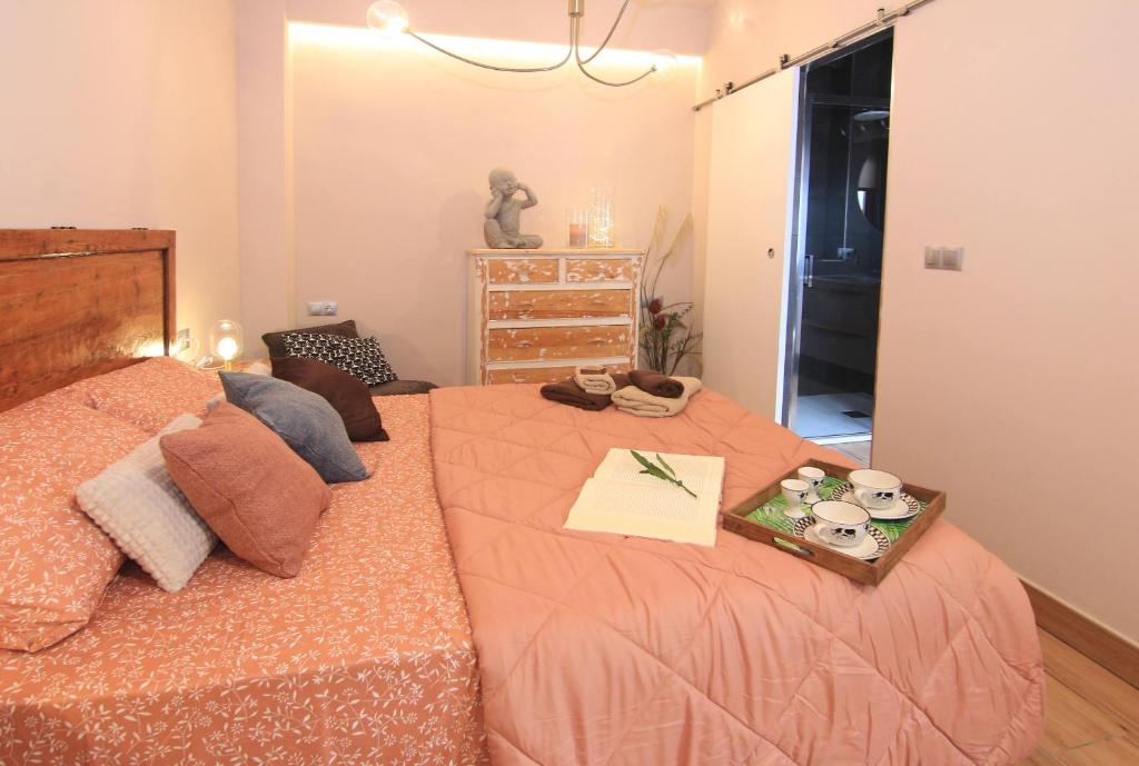 Postel nebo postele na pokoji v ubytování Casa Marrón Boutique Home