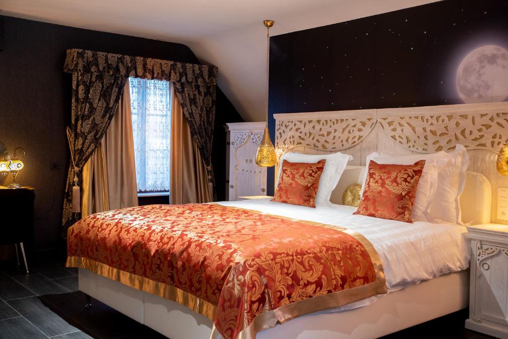 Postel nebo postele na pokoji v ubytování B&B 1001 nacht