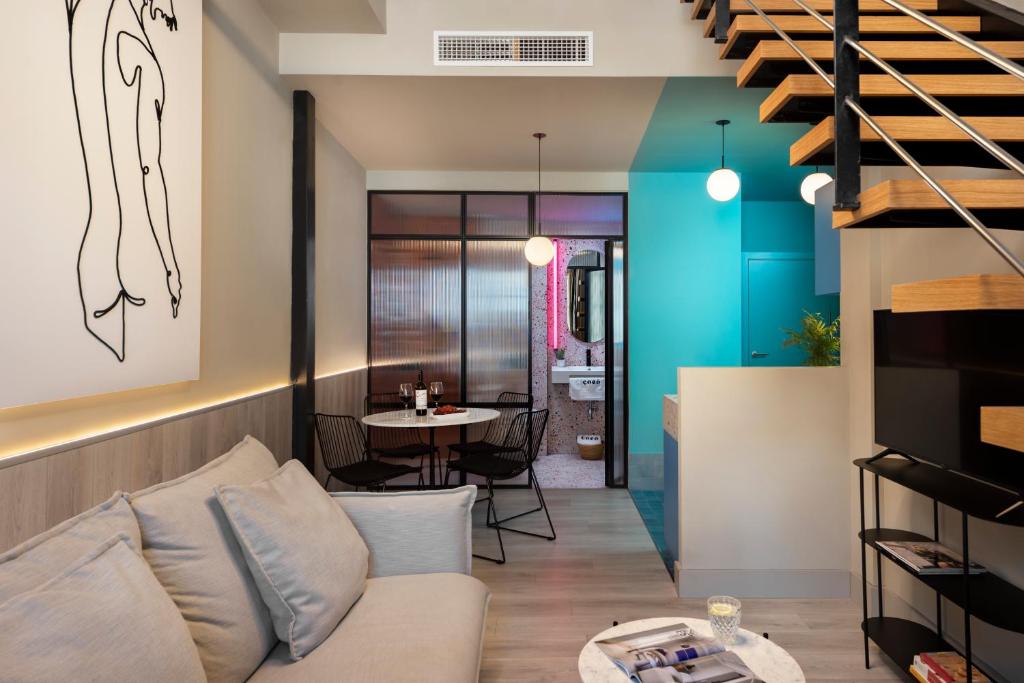 A seating area at Coeo Peña Design Apartments