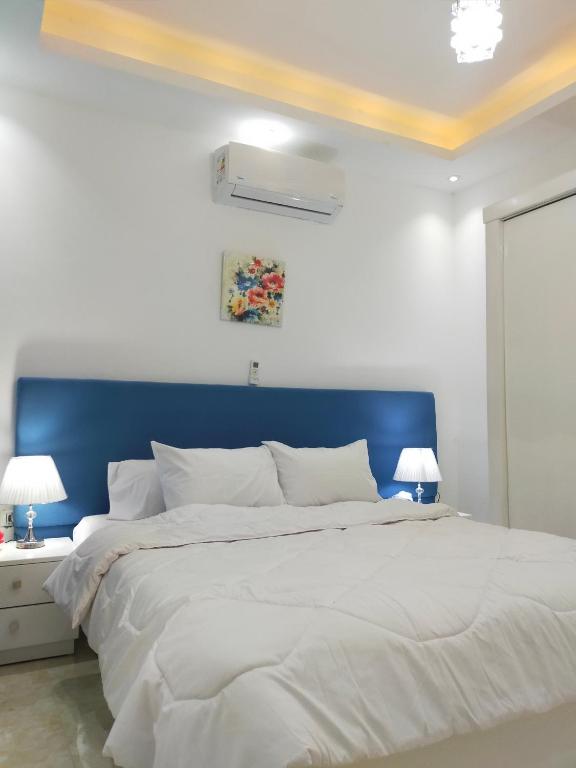 A bed or beds in a room at Red Sea Panorama