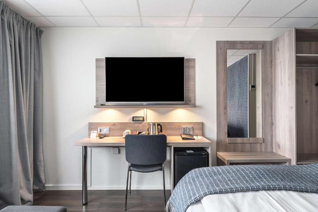 TV a/nebo společenská místnost v ubytování Best Western Hotel Vrigstad