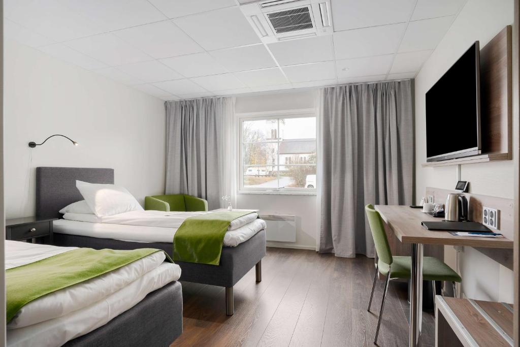 Postel nebo postele na pokoji v ubytování Best Western Hotel Vrigstad
