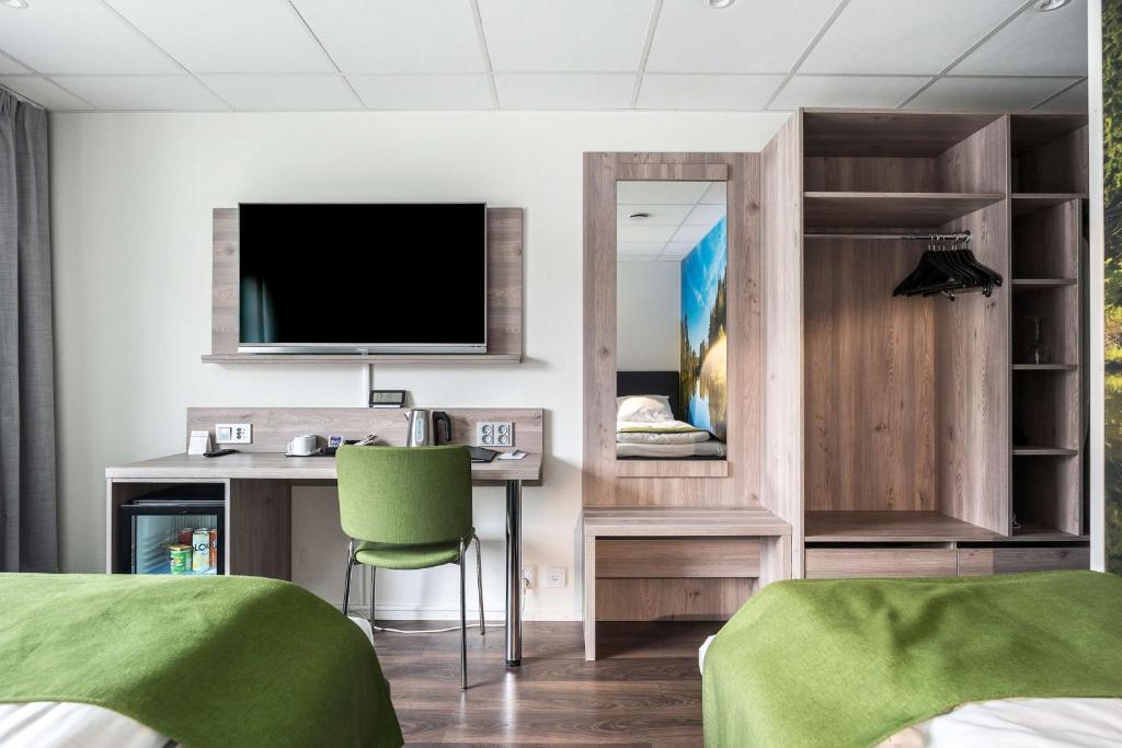 TV a/nebo společenská místnost v ubytování Best Western Hotel Vrigstad