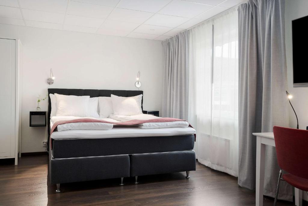 Postel nebo postele na pokoji v ubytování Best Western Hotel Vrigstad