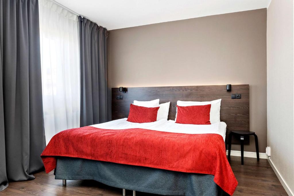 Postel nebo postele na pokoji v ubytování Best Western Hotel Savoy
