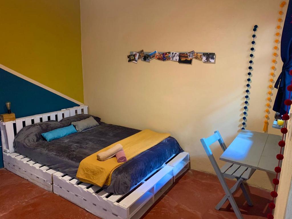 Postel nebo postele na pokoji v ubytování Hostal 23