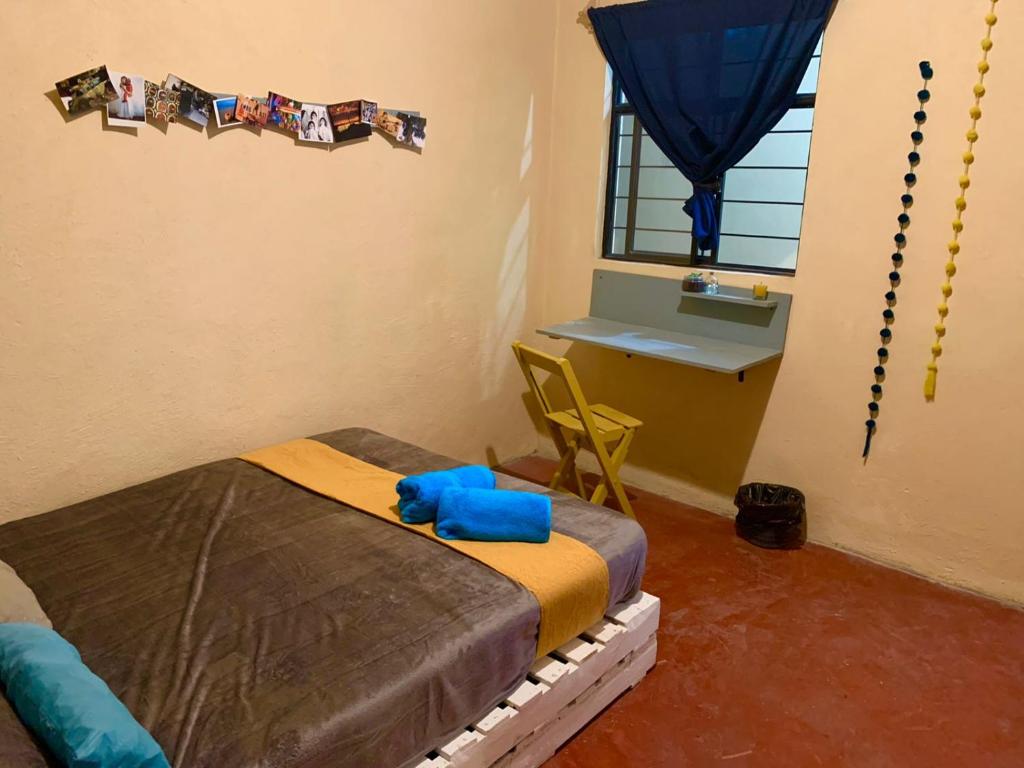 Postel nebo postele na pokoji v ubytování Hostal 23