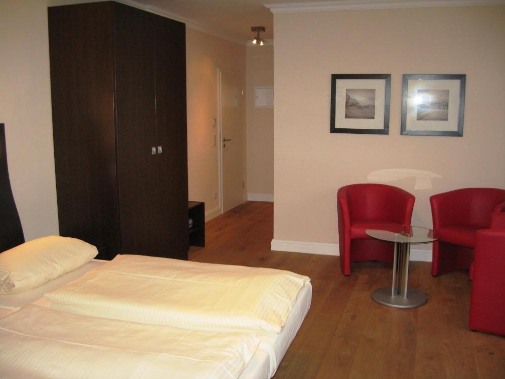 Postel nebo postele na pokoji v ubytování Hotel Kiose