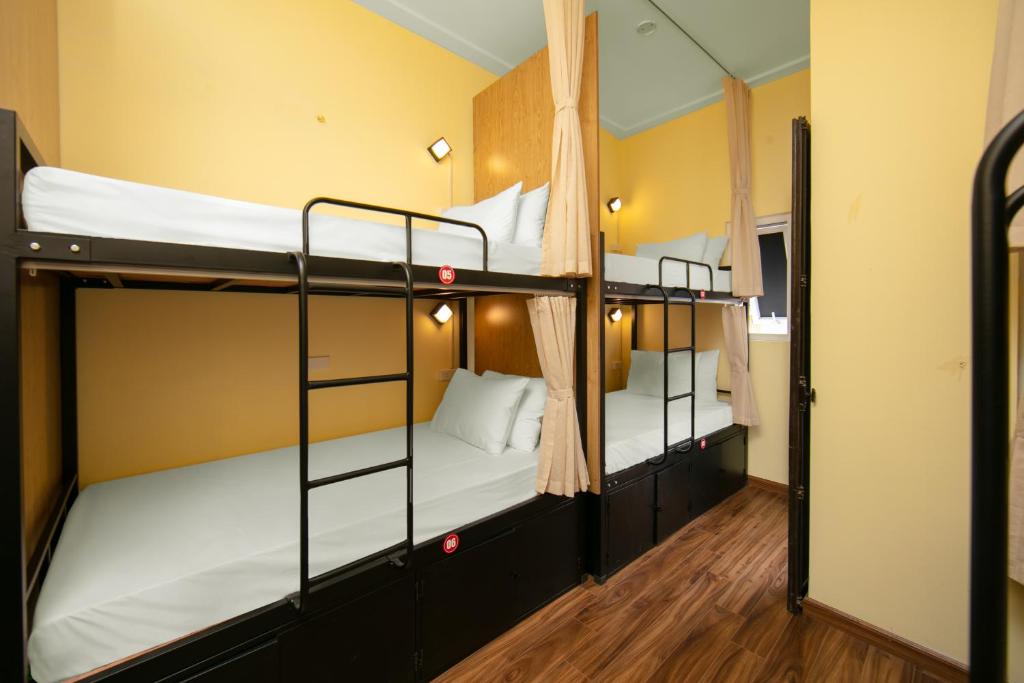 Postel nebo postele na pokoji v ubytování Drift Backpackers Hostel