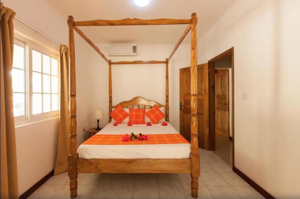 Postel nebo postele na pokoji v ubytování Villa Confort