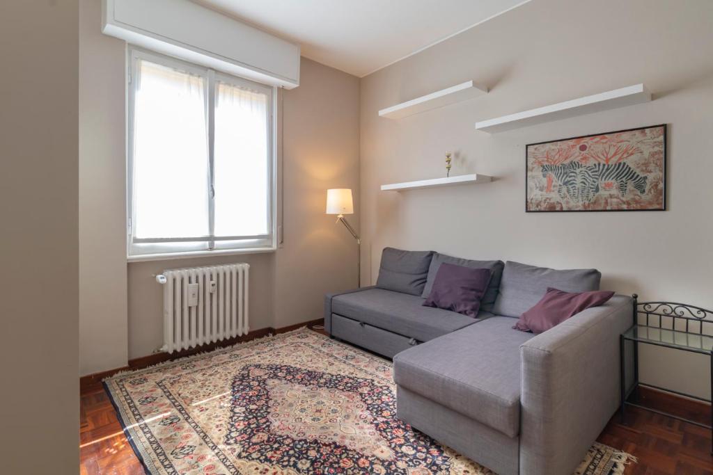 A seating area at [Portello Apartment] - Accursio 4