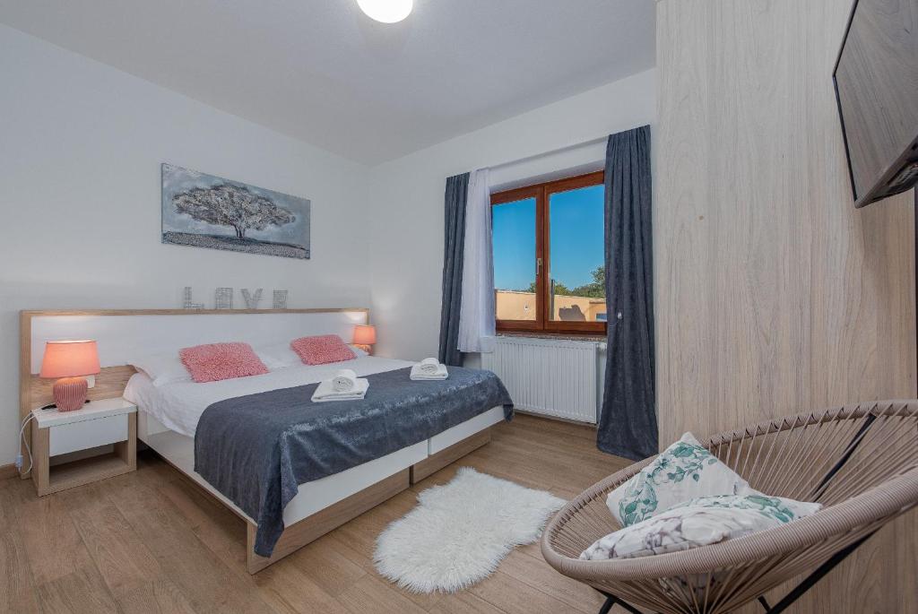 Posteľ alebo postele v izbe v ubytovaní Villa Kamen ZadarVillas