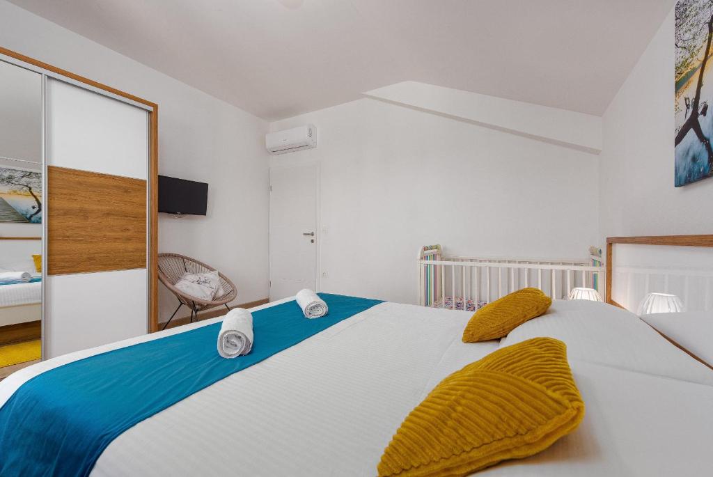 Posteľ alebo postele v izbe v ubytovaní Villa Kamen ZadarVillas