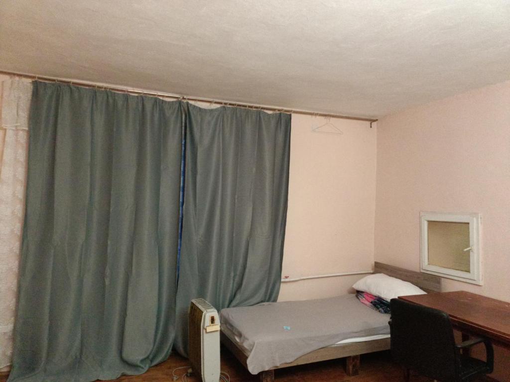 Postel nebo postele na pokoji v ubytování Krone Hostel