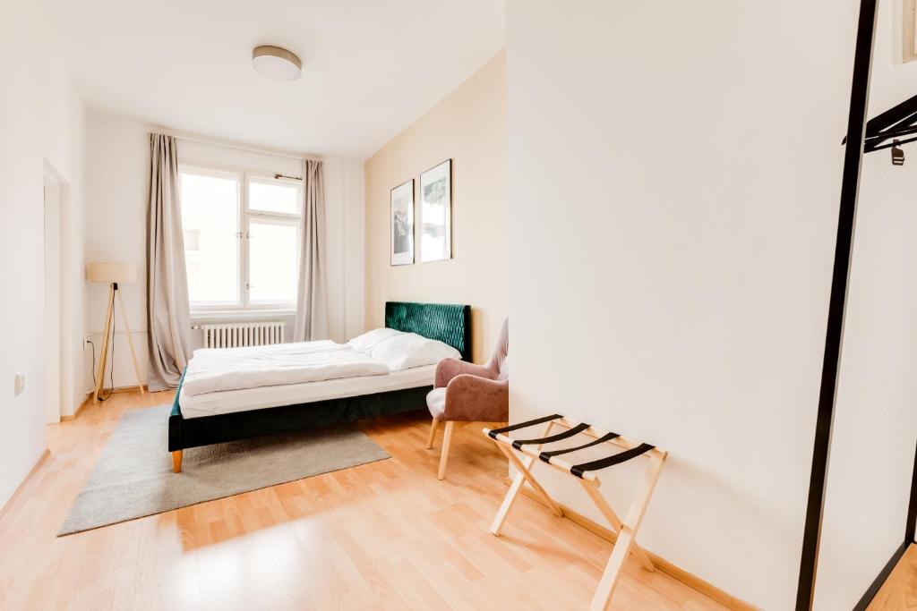 Łóżko lub łóżka w pokoju w obiekcie Riben House Prague