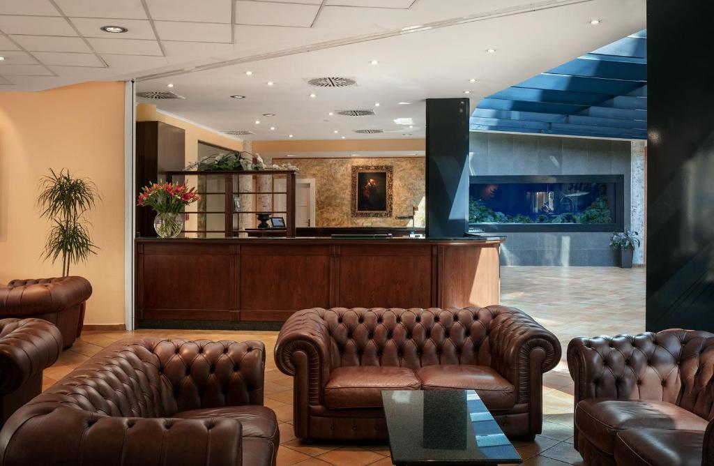 Posezení v ubytování Hotel Roma Prague