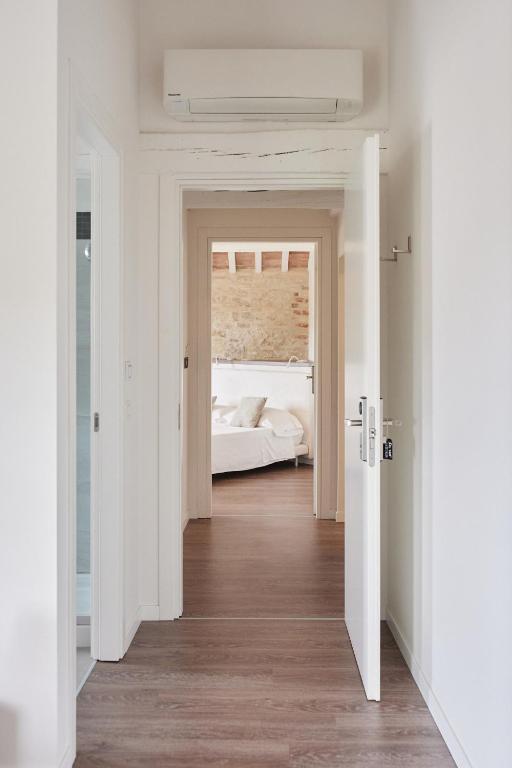 Posteľ alebo postele v izbe v ubytovaní Borgo della Spiga - Adult Friendly Country House
