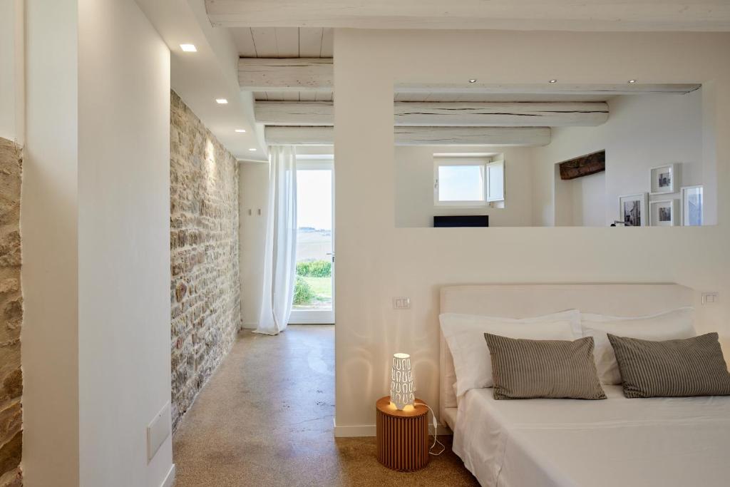Posteľ alebo postele v izbe v ubytovaní Borgo della Spiga - Adult Friendly Country House