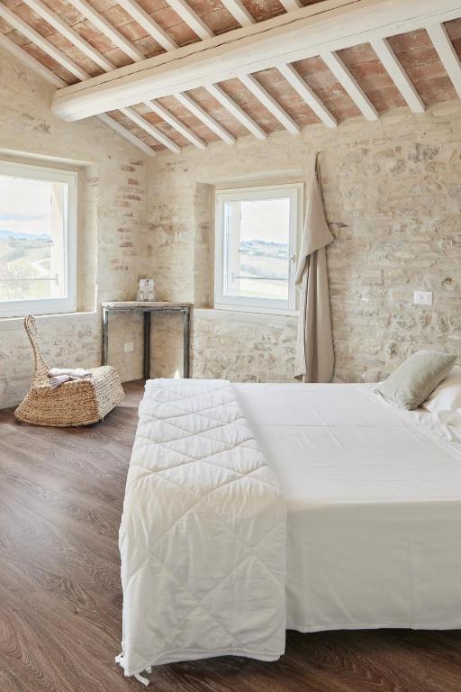 Posteľ alebo postele v izbe v ubytovaní Borgo della Spiga - Adult Friendly Country House