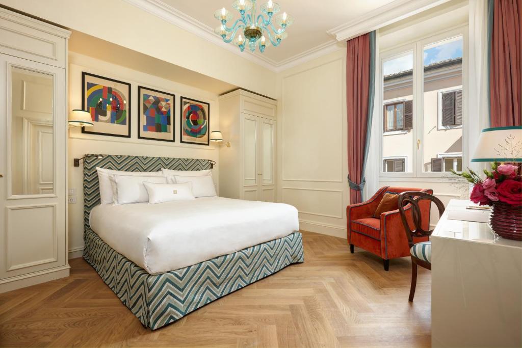 Postel nebo postele na pokoji v ubytování Palazzo Ripetta