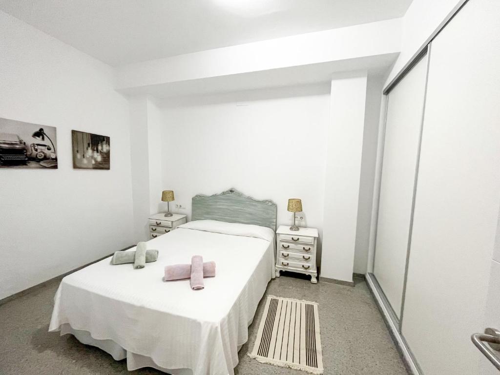 Posteľ alebo postele v izbe v ubytovaní Amplio apartamento en Av. Carlos Haya