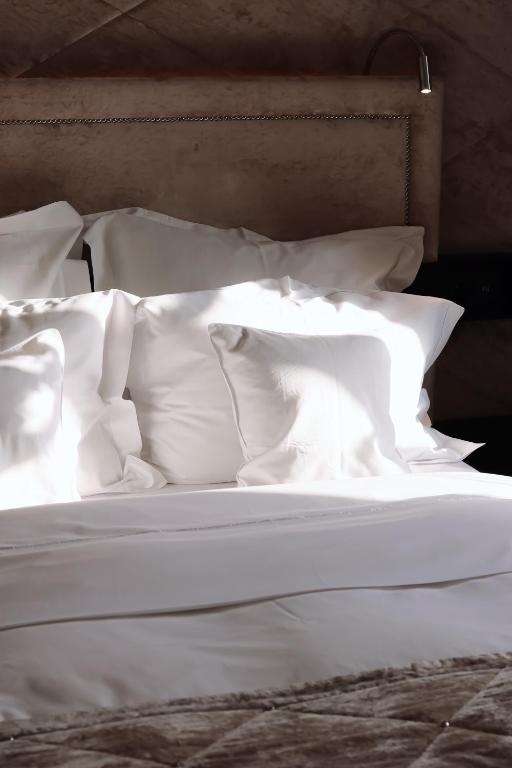 Postel nebo postele na pokoji v ubytování Hotel Crystal - KitzHorn Suites
