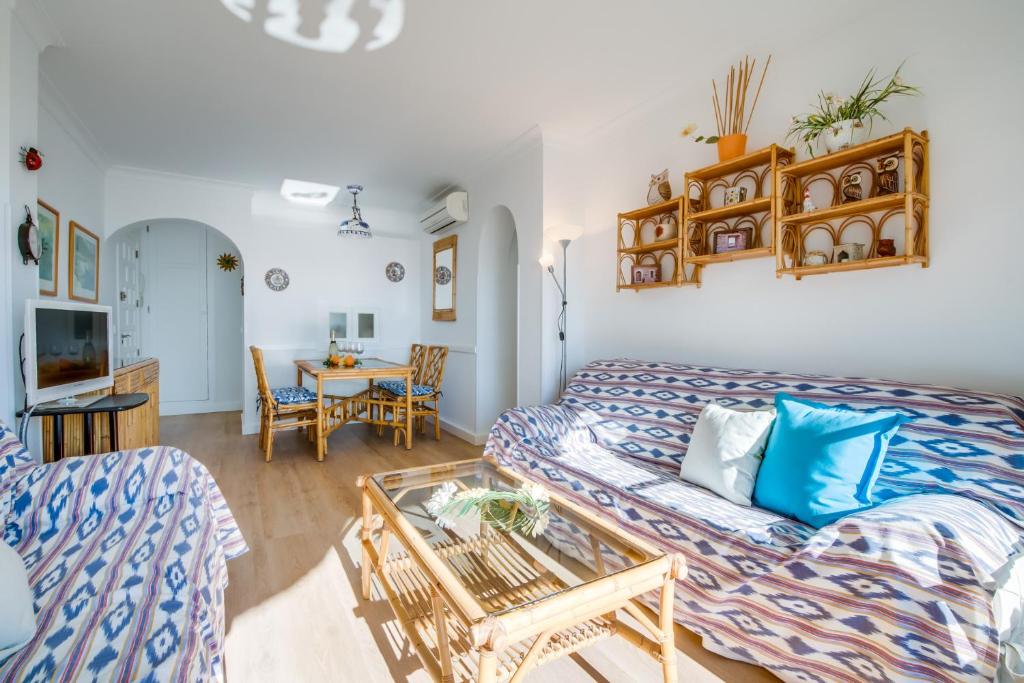 Televízia a/alebo spoločenská miestnosť v ubytovaní Ideal Property Mallorca - Carabela 44