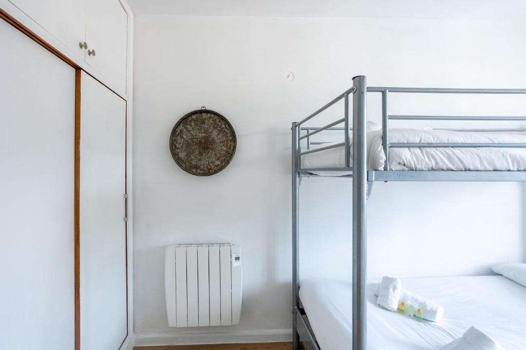 Postel nebo postele na pokoji v ubytování El Mirador de Urdaibai