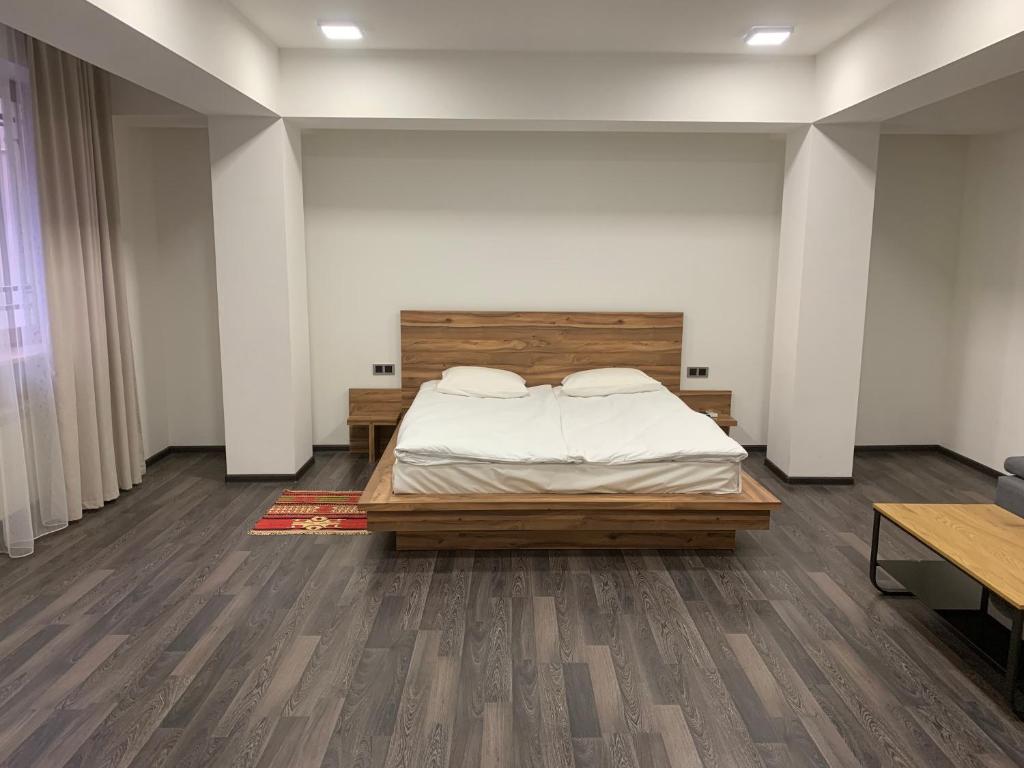 Postel nebo postele na pokoji v ubytování One Day Hotel