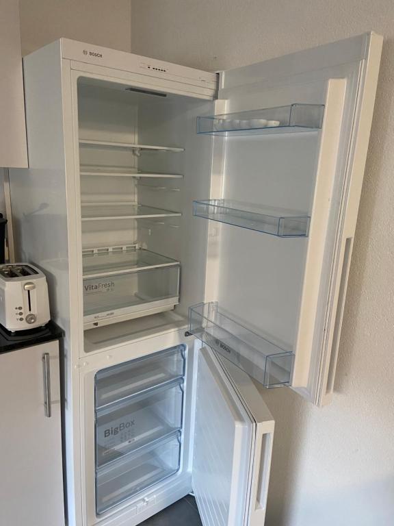 Kuchyň nebo kuchyňský kout v ubytování Gemütliche Ferienwohnung EVIELINE in Todtnau