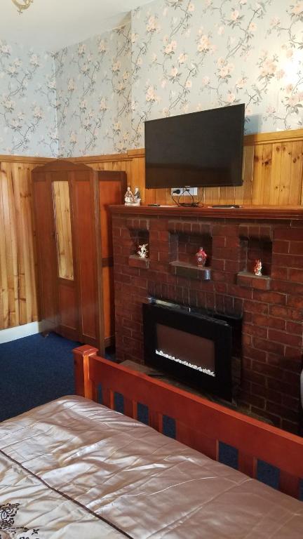TV a/nebo společenská místnost v ubytování Hunters Hotel