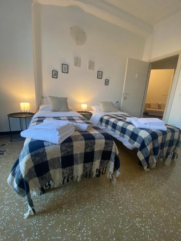 Postel nebo postele na pokoji v ubytování CASA AMEDEO