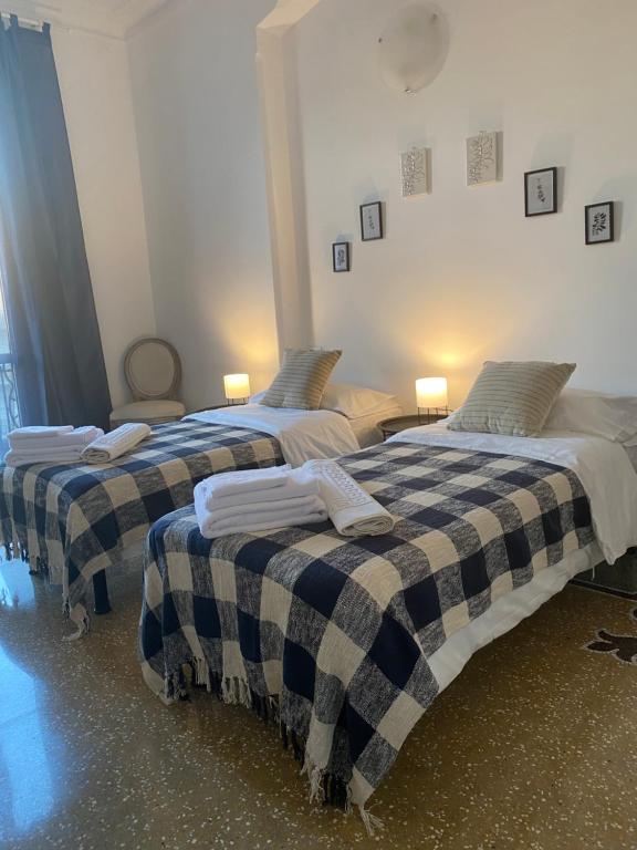 Postel nebo postele na pokoji v ubytování CASA AMEDEO