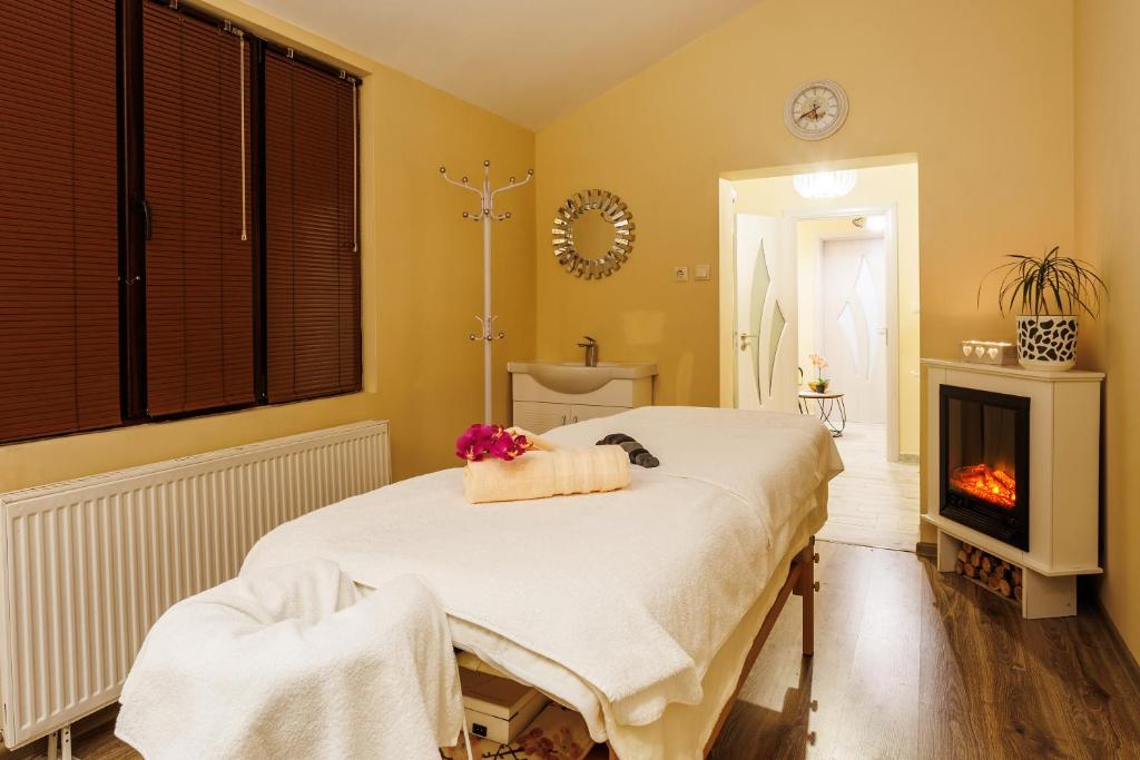 Postel nebo postele na pokoji v ubytování Spa Hotel Aspa Vila