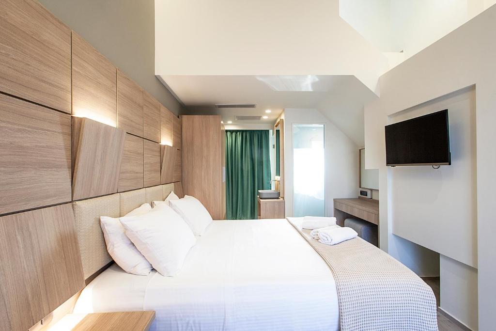 Postel nebo postele na pokoji v ubytování ALTHAEA LUXURY ROOMS