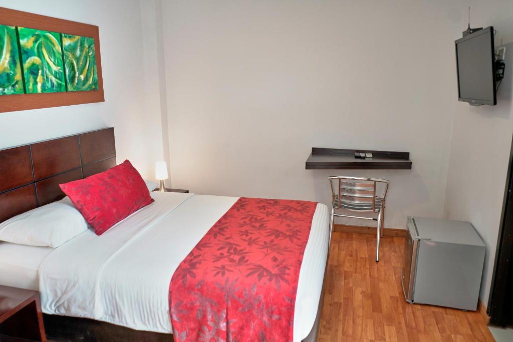 Cama o camas de una habitación en Hotel Volare