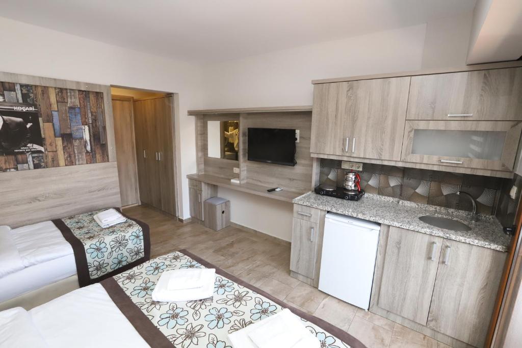Kuchyň nebo kuchyňský kout v ubytování Street61 Apart Hotel