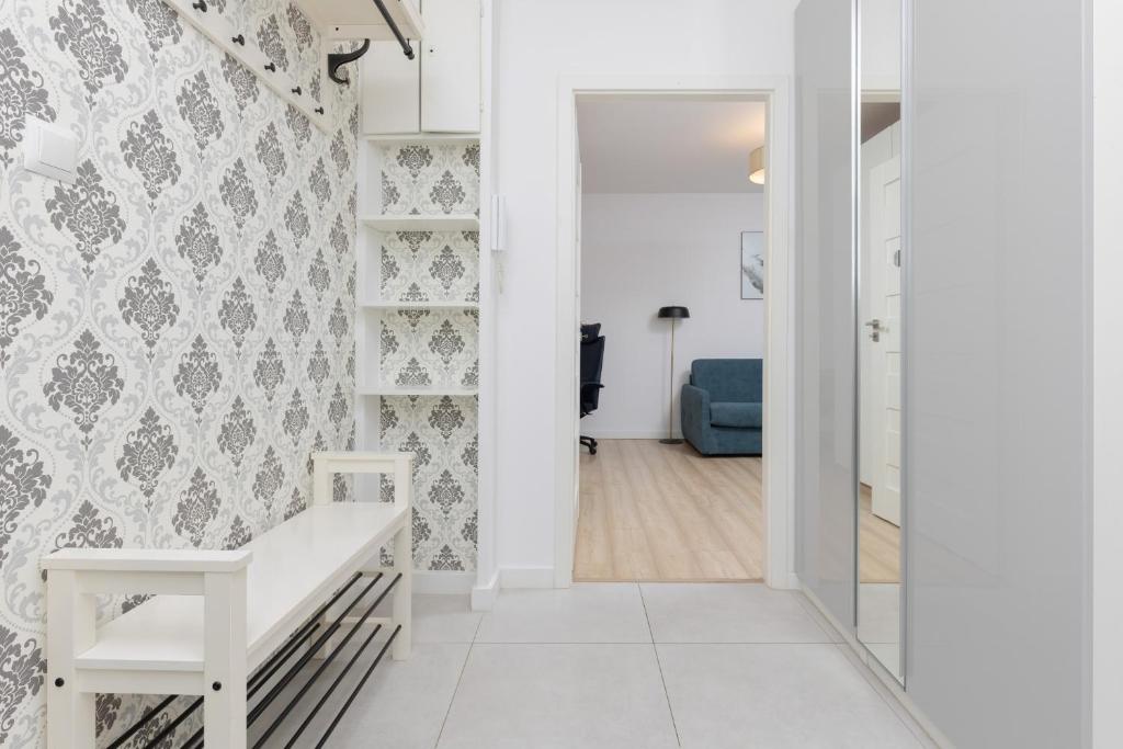 Posteľ alebo postele v izbe v ubytovaní Warsaw Portofino Apartment by Noclegi Renters