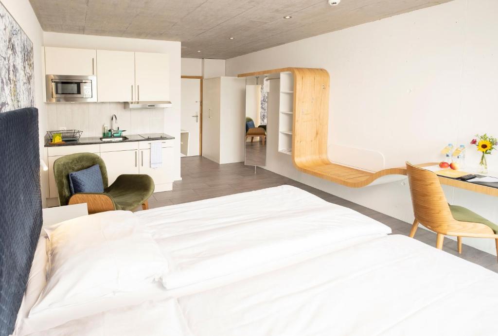 Kuchyň nebo kuchyňský kout v ubytování Tailormade Hotel IDEA Spreitenbach