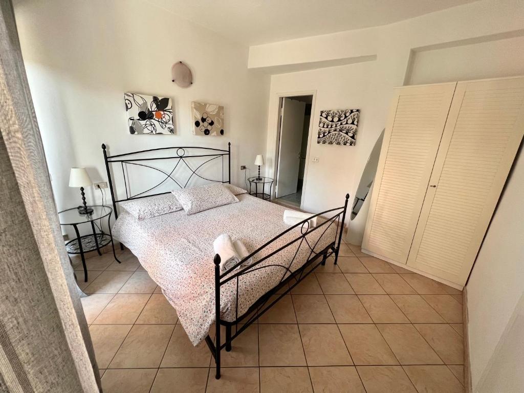 Postel nebo postele na pokoji v ubytování Borgo Antico Apartments
