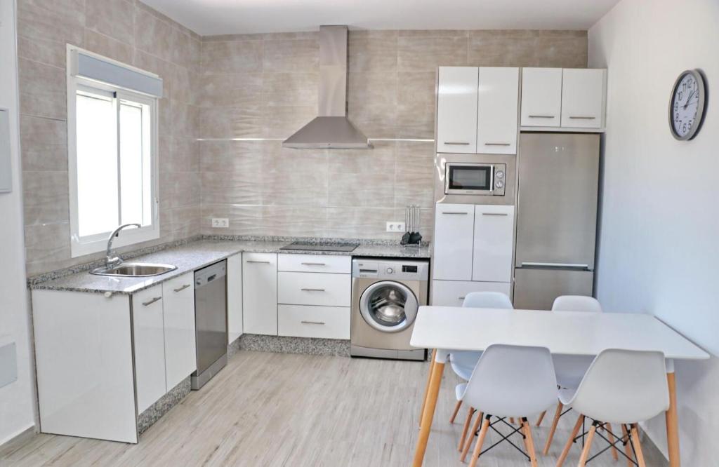 Kuchyňa alebo kuchynka v ubytovaní Chalet Lobita