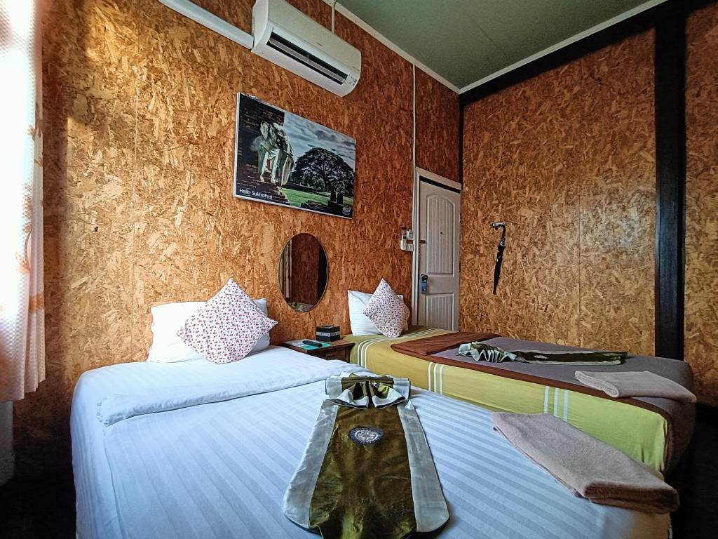 Postel nebo postele na pokoji v ubytování Aenguy Hostel