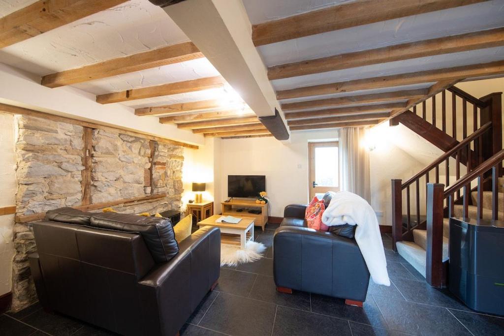 TV a/nebo společenská místnost v ubytování Lomas Cottage